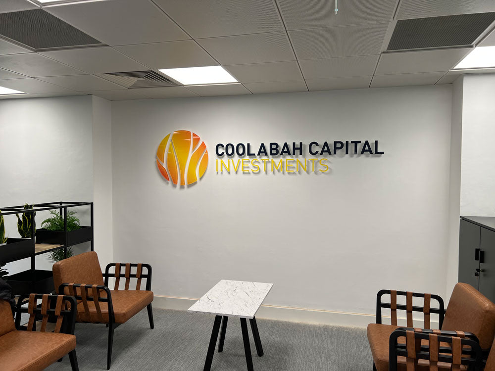 Office lobby with wall-mounted Coolabah Capital Investments 3D logo signage