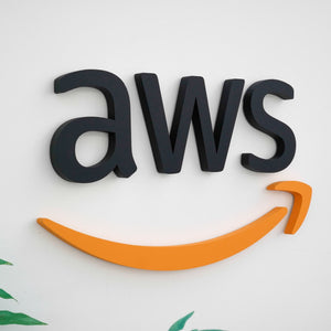 AWS wall logo with black letters and orange smile arrow branding.