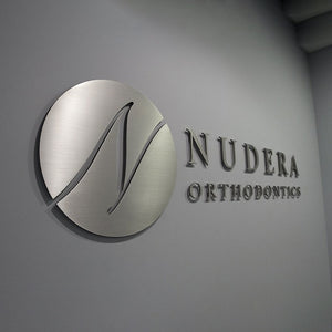 3D wall sign with brushed Aluminium wall signs - 3D logo with stand off fixings and sign locators for company office logo wall signs